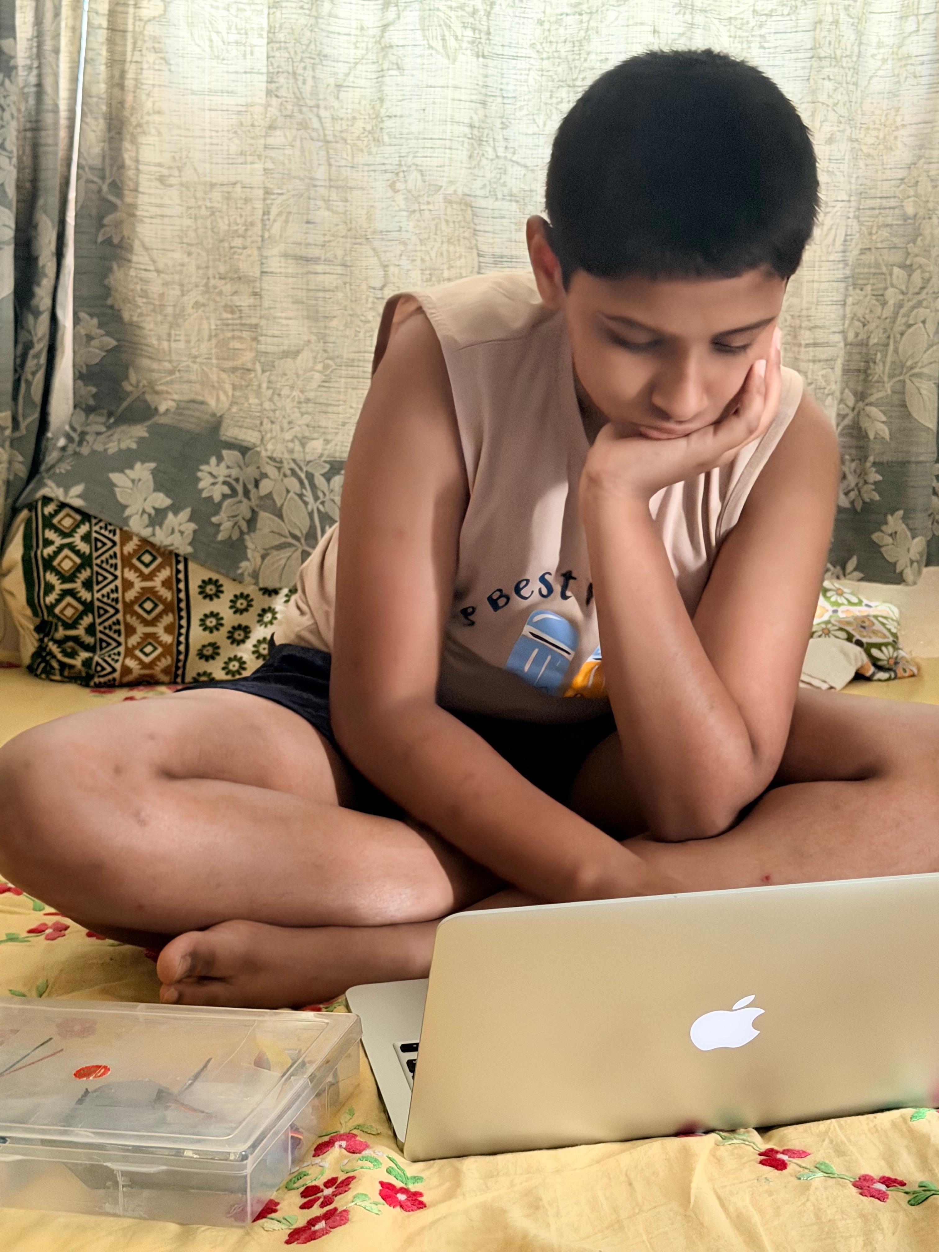 Anish working through Day 1 on his laptop, 13 April 2026